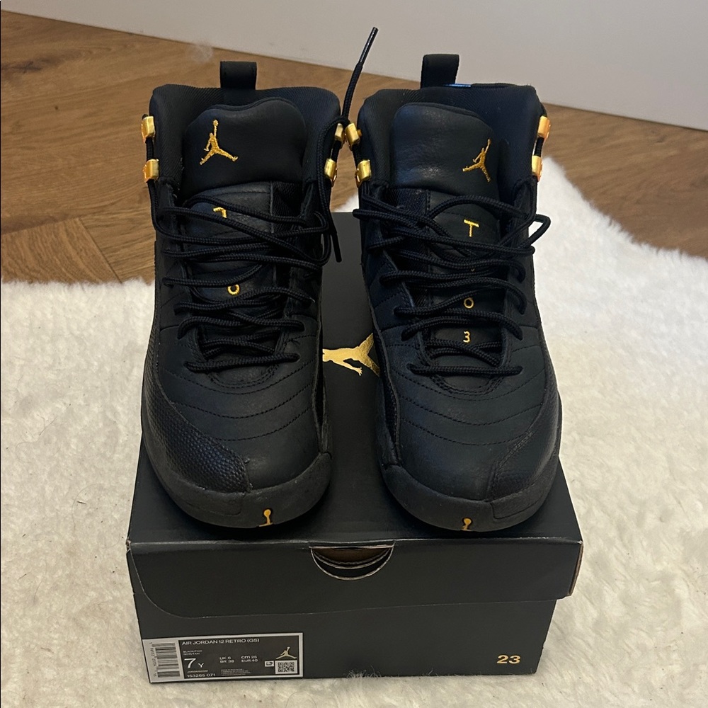 Jordan Boys Black Sneakers with Gold Highlights
